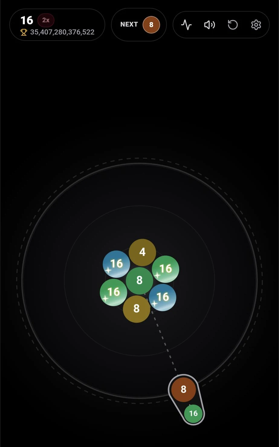 Gravity Blobs on a phone: numbered blobs clustered at the center of a circular arena, with the next blob aimed from the rim.